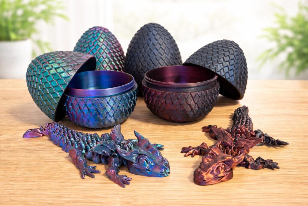 Dracheneier mit beweglichen Drachen aus dem 3D-Druck in verschiedenen Farben